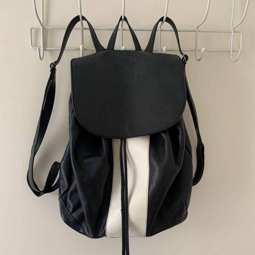Black and white leather backpack